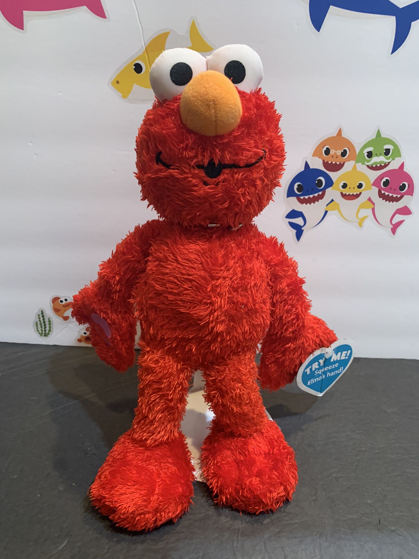 ELMO BRAND NEW DOLL! SAYS MULTIPLE I LOVE  YOU PHRASES! LIFT HIS HAND TO HIS MOUTH AND HE SAYS MUAH AND MAKES KISS SOUND! New