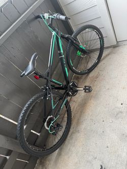 Black and Teal Mountain Bike with Shimano Drivetrain