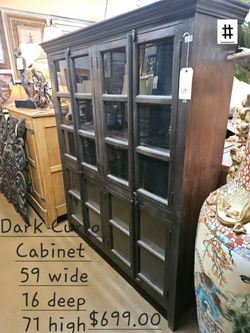 Curio Cabinet large DarkWe are located at 2811 East Bell road. Another Time Around Furniture.