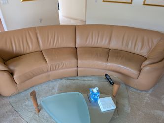 Beautiful Italian leather couch 12ft long (curved)