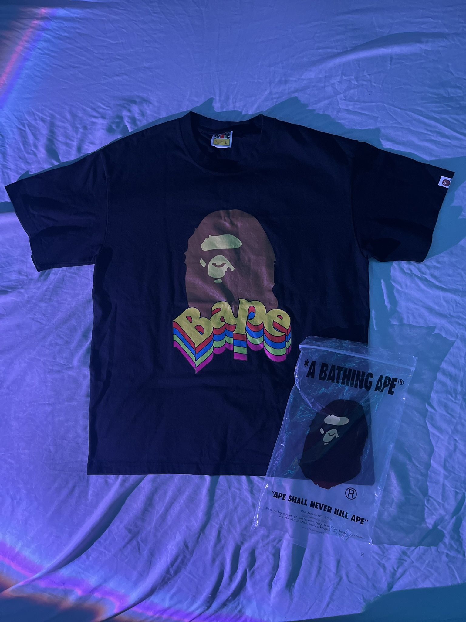 BAPE tee with multi-coloured wording/details #BAPE Size-Large