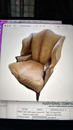 Gorgeous wingback cowhide chair