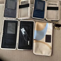 There Is four wallets one of them. It is coach wallet, and all four for $30 total.