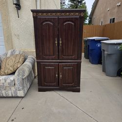 This is a Kincaid Furniture Cherry Mountain III Traditional Style media armoire in solid cherry wood. 