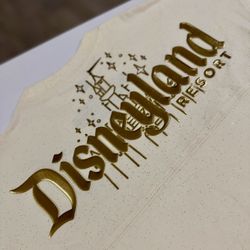 NWT Gold Foil Castle Cream Disneyland Spirit Jersey 