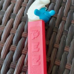  Smurf on a red stem was released in the late 1980's or early 90's as a part of the Series I Smurfs Pez Austria stem. 