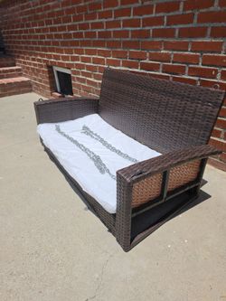 wicker or resin rattan porch swing