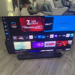 Samsung 65” Flat Screen TV with Sound Bar And Subwoofer 