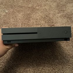 Xbox One X With Two Controllers And Fallout 4