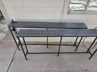 Two 63 inch long sofa table with power outlet.