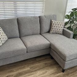 Light Gray Stark Modern 80” Sectional Sofa with Reversible Chaise by Living Spaces
