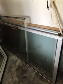 8 foot pocket siding door and pocket window. 2nd pic is where the window was.