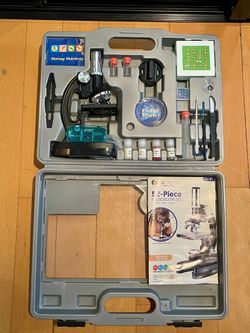 Beginner microscope with carrying case Never Used