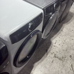 Electrolux White Frontload Washer And Gray Frontload Gas Dryer