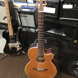 2001 ACOUSTIC-ELECTRIC TAKAMINE GUITAR