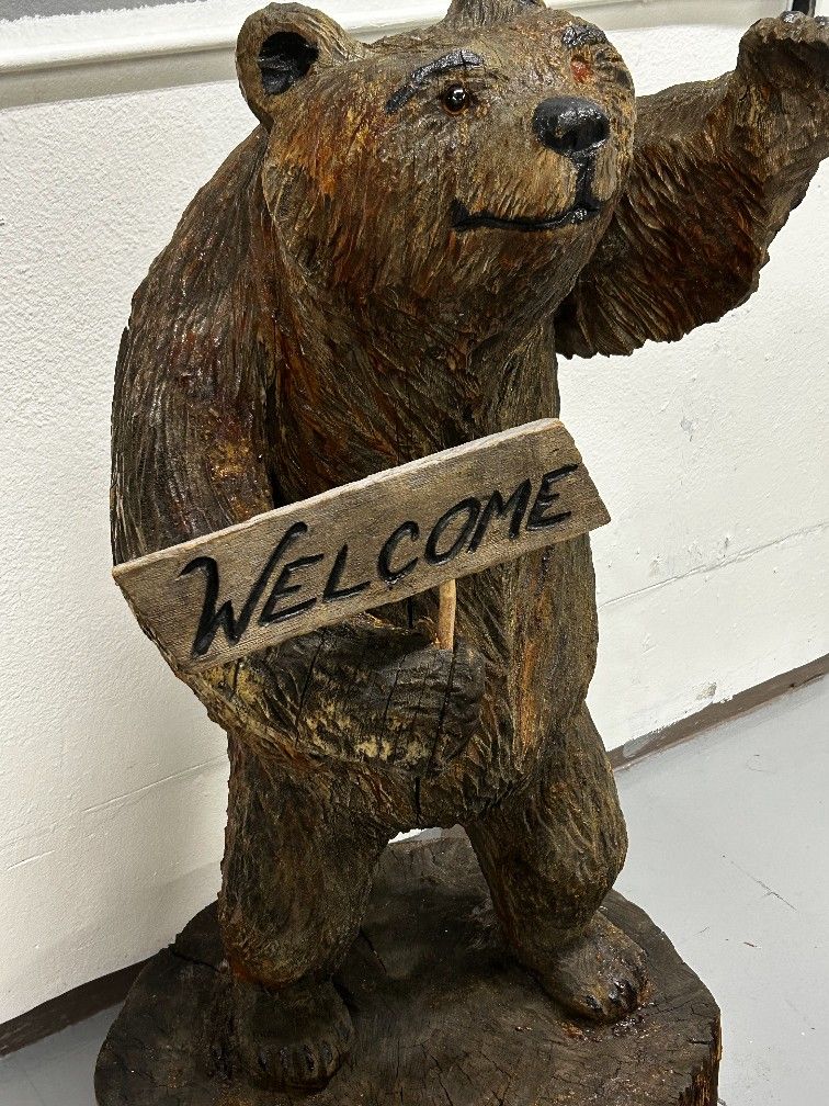 Wooden Big bear carved from a log. Weighs approximately 130 lbs and stands 46 inches tall.