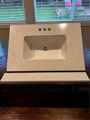 NEW - White Marble Quartz Countertop with white ceramic sink and backsplash