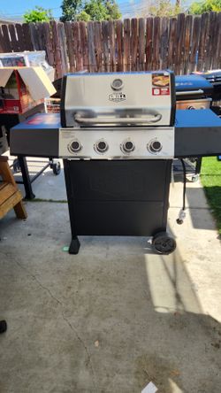 Expert Grill, 4-Burner Propane Gas Grill with Side Table and Wheels, Stainless Steel