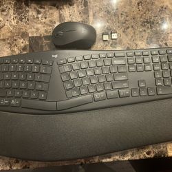 Logitech ERGO K860 ergnomic Bluetooth keyboard and M550 mouse