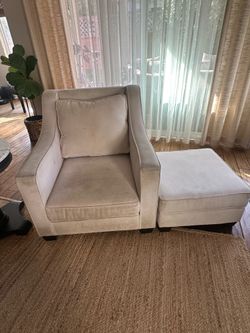 white armchair with ottoman