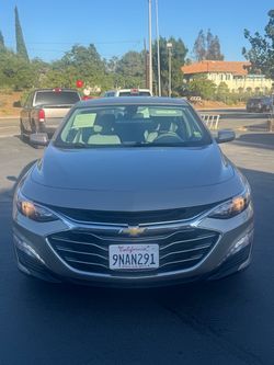 Gold Chevy malibu
