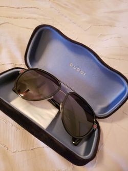 Black Gucci Sunglasses.