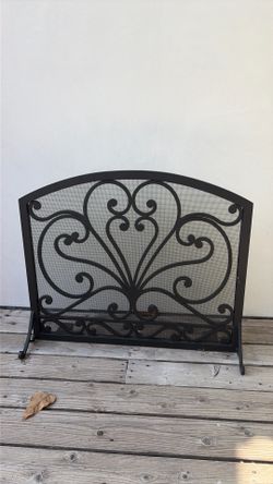 Custom made wrought iron fireplace screen
