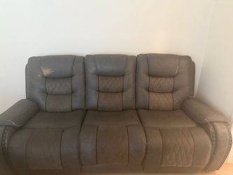 Two couches both recline