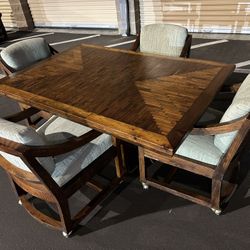 Vintage dining table with chairs on wheels/comedor con sillas con llantas