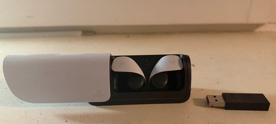 PS5 earbuds with connector dongle