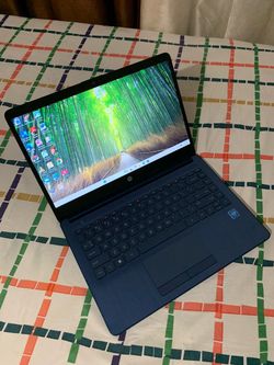 14"inch Intel Celeron HP Laptop, 4GB RAM, 64GB eMMC, HDMI, Type C Port, Inbuilt Bluetooth, SD Card Reader And a WebCam. Windows 11 Installed.