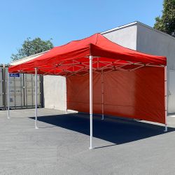 New in Box $220 Heavy-Duty EZ Popup Canopy 10x20’ with (2 Sidewalls) Outdoor Gazebo, Carry Bag (Blue/Red)