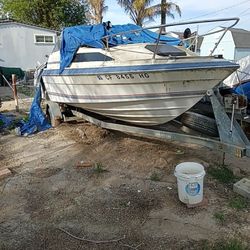 21 ft Bayliner and Trailer as is.Inboard Outboard 