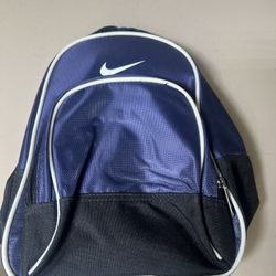 Nike Blue/Black Trim Small Sling 14” Back Pack Smaller Backpack Bag Adjustable. Barely used in excellent condition with minimal signs of usage.