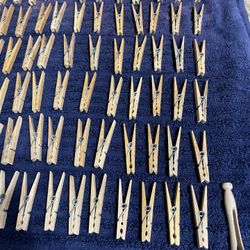 Quantity of 97 Wood clothespins for hanging laundry line