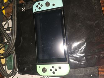 Nintendo Switch with Mint Green Joy-Cons
