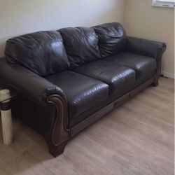 Leather Couch And 2 Tables