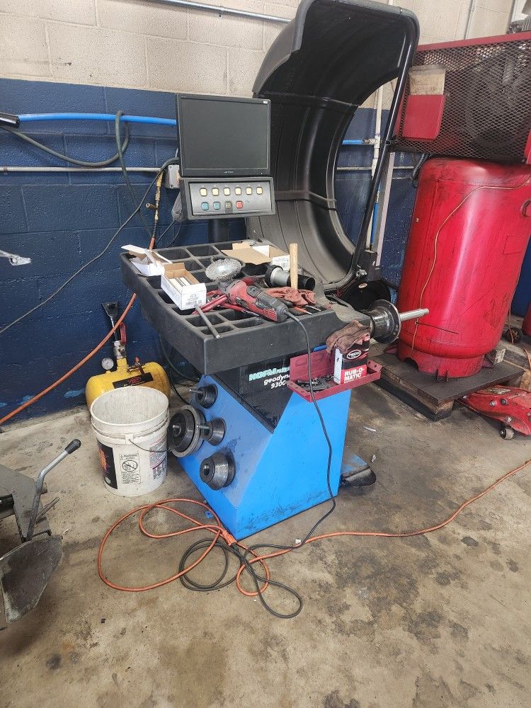 Tire Machine And Balancer.