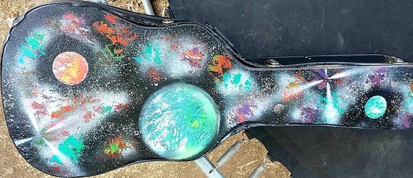 Guitar cases and poster