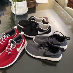 Nikes Size 4, Three Sets White , Black and Red