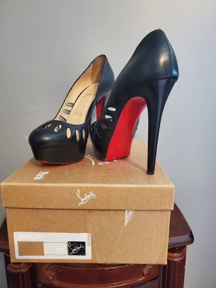 Authentic CHRISTIAN LOUBOUTIN RED BOTTOMS