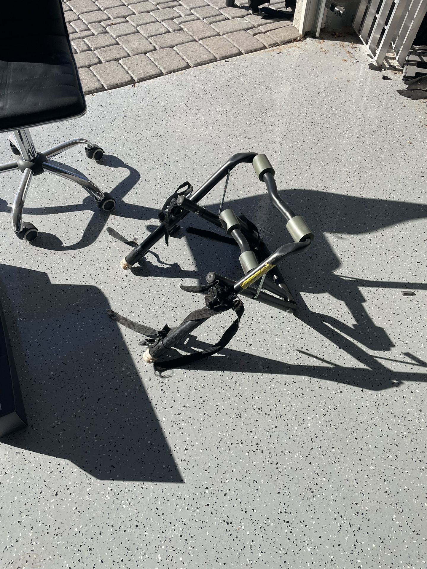 Small bike rack for exterior of car trunk.