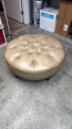 Tan Leather Ottoman / Wood Legs/ Bronze Detail