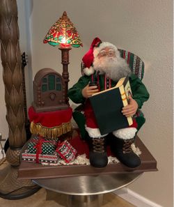 Animated Santa with chair and lamp