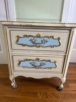 Matching French Provincial vintage bedside tables with drawers.