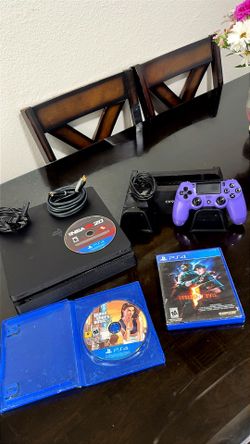 PS4 with controller & games