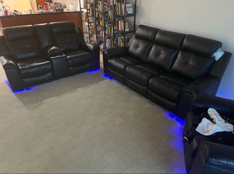 Real Ashley Leather Reclining Couches with LED built in