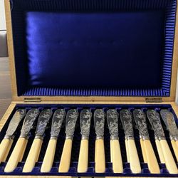 A Set of 12 Antique Sterling Silver Fish Knives and Forks