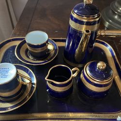 Elegant blue and gold porcelain coffee set by Legle Limoges.