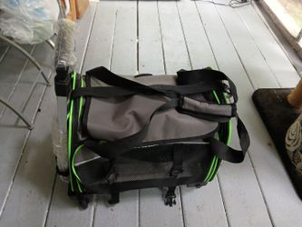Green gray and black pet carrier airline approved on Wheels with travel case removable